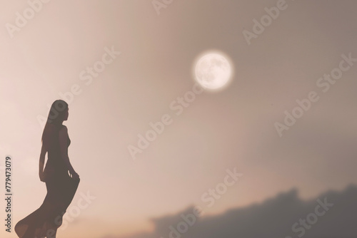 woman dancing backlight illuminated by a surreal moon, energy concept