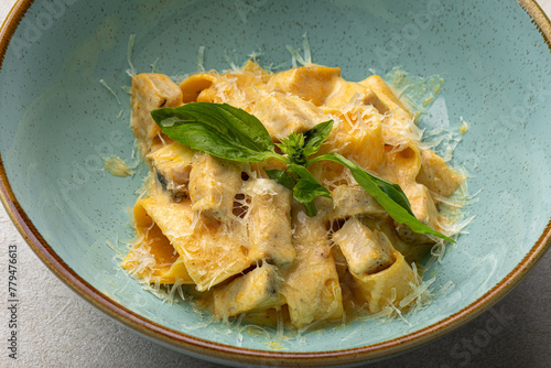 Portion of fettuccine pasta with chicken and parmesan