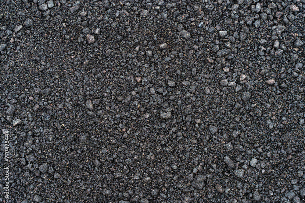 Black soil texture background. Black land surface. Farm agriculture field. Black soil texture background. Black land surface. Farm agriculture field.
