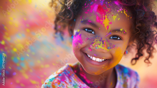 Cheerful african american girl at the festival of colors Holi