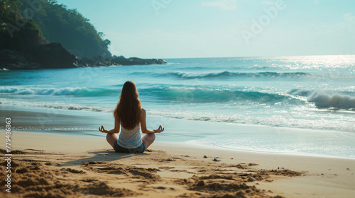 The connection between mind and body, a woman doing yoga on the beach. The concept of calmness and relaxation