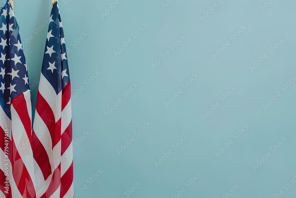 Obraz premium Independence Day (July 4th, in the us) Two USA flags on a blue background, copy space concept for National provender day 