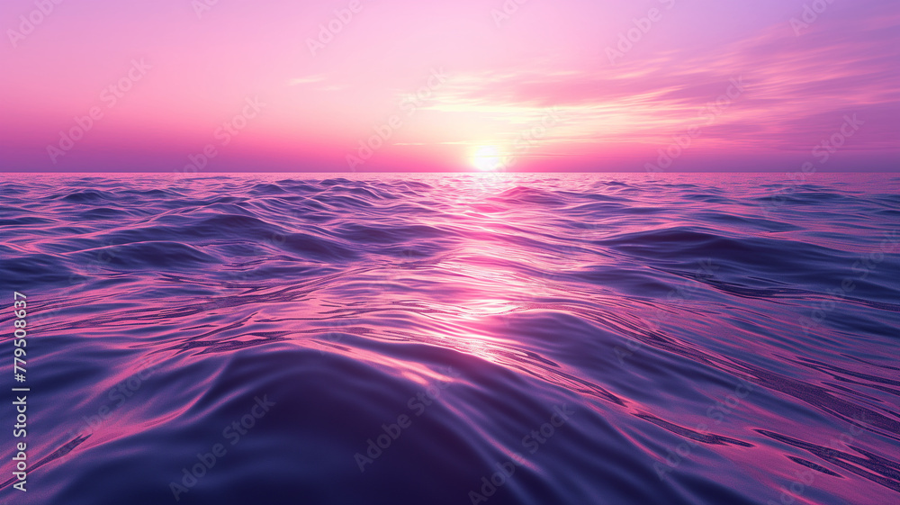 The ocean is a deep blue color with a pink sunset in the background