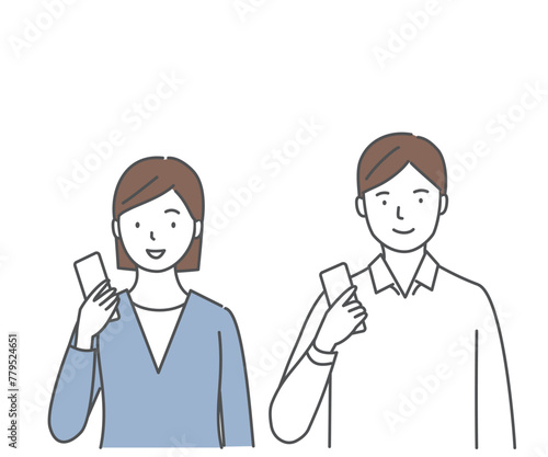 スマートフォンを持つ男性と女性 © karinrin