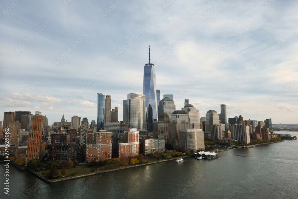 Fototapeta premium New York city Manhattan skyline from New Jersey. Manhattan over the Hudson river. NYC cityscape, aerial view. Manhattan downtown skyline with urban skyscrapers. New York Manhattan from above.