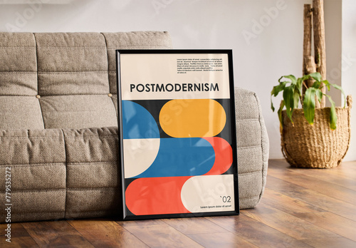 Mockup of customizable vertical poster frame by couch