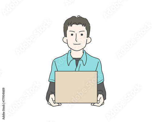 段ボール箱を正面に抱えた若い男性スタッフ