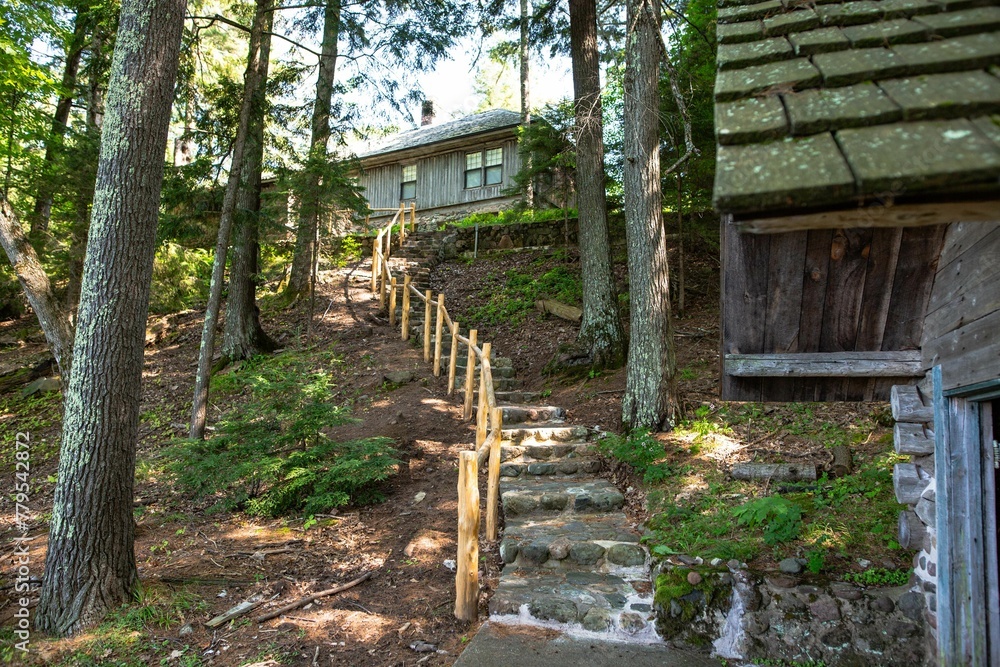 Beautiful shot of stone steps in the woods with houses around in Land O Lakes, Wisconsin Beautiful shot of stone steps in the woods with houses around in Land O Lakes, Wisconsin