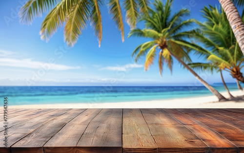 wooden empty table on the beach under a palm tree with an ocean view