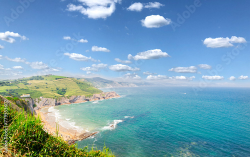 panorama of Itzurun beach and hills of Zumaia coast, Pais Vasco Spain photo