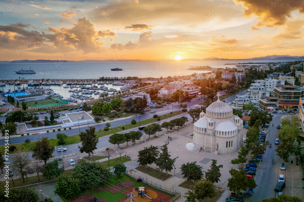Fototapeta premium Aerial sunset view of the Saint Constantine square and church in Glyfada district, south Athens, Greece