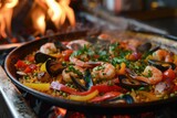 Traditional Seafood Paella with Shrimp, Mussels, and Fresh Vegetables Over Open Flame