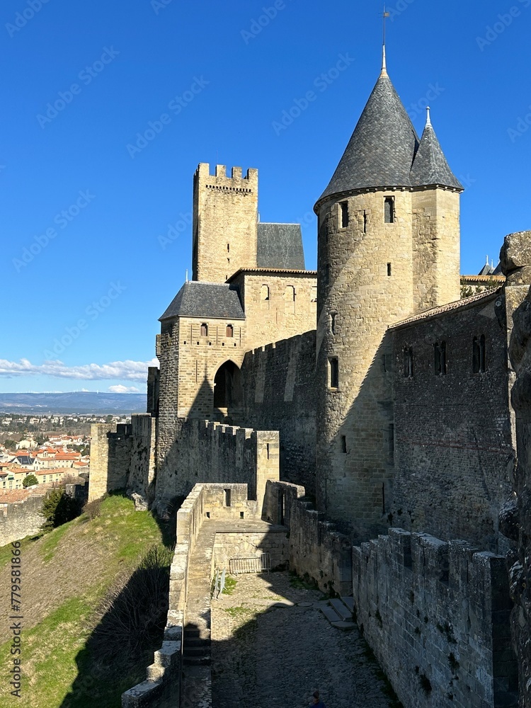 Cité de Carcassonne citadel under the blue sky, Carcassonne, Occitania, France, February 2023
