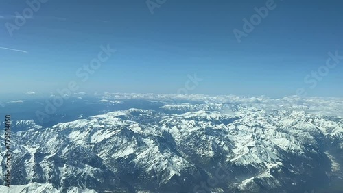 Wallpaper Mural Pilot POV flying over The snowed  Apls mountains at 10000m high, shot from a jet cockpit. 4K Torontodigital.ca