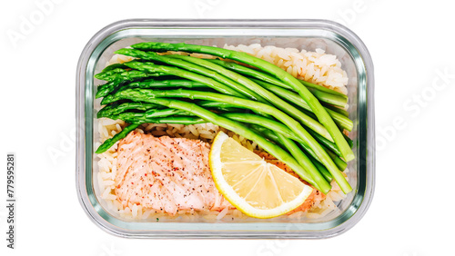 Healthy lunch box with steamed salmon, asparagus and lemon isolated on white background