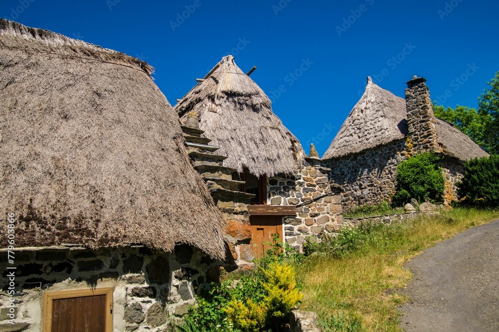 Scenic view of houses with thatched roofs of Bigorre in Upper Loire in France on a sunny day