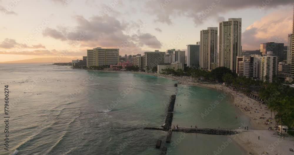 Drone Flying Over Waikiki Beach in Oahu at Sunset Drone Flying Over Waikiki Beach in Oahu at Sunset