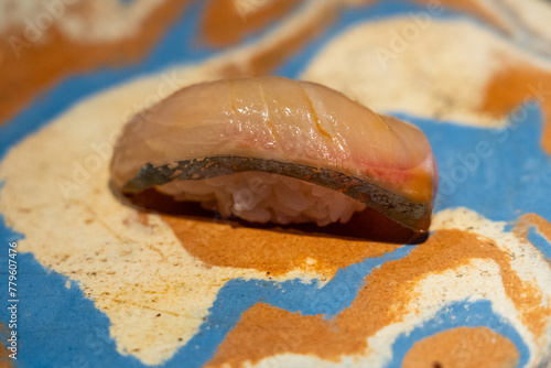 Aging saba sushi in omakase course  - Seasoning mackerel sushi.