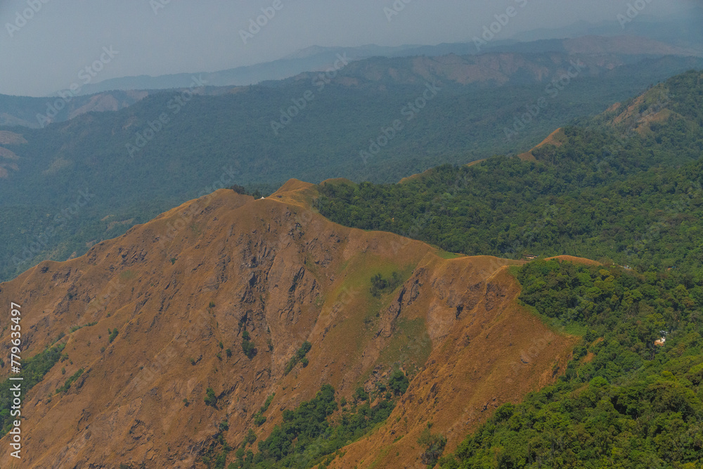 A mountain range with a brownish tint