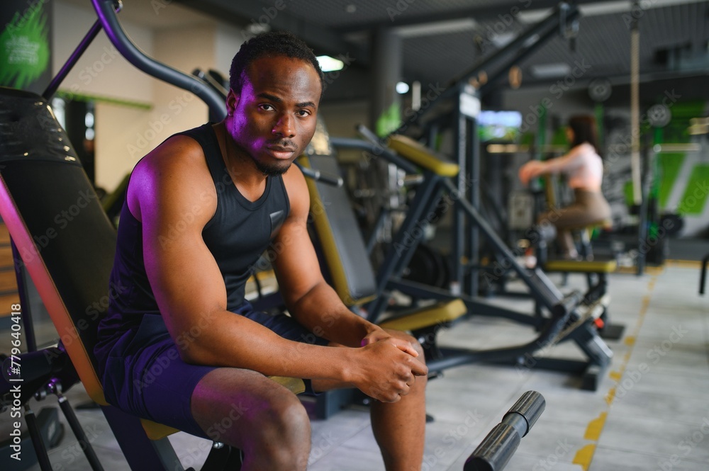 Fototapeta premium Black African American young man at the gym