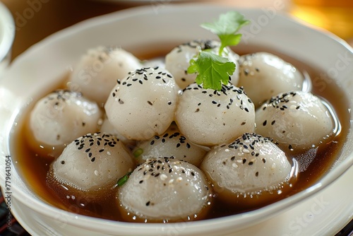 Popular Thai dessert Black sesame rice balls in ginger syrup