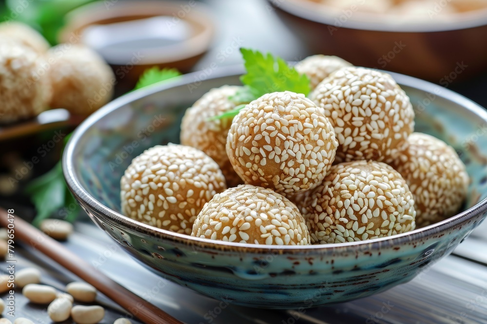 Sesame ball is a tasty Chinese treat filled with bean paste and glutinous rice Sesame ball is a tasty Chinese treat filled with bean paste and glutinous rice