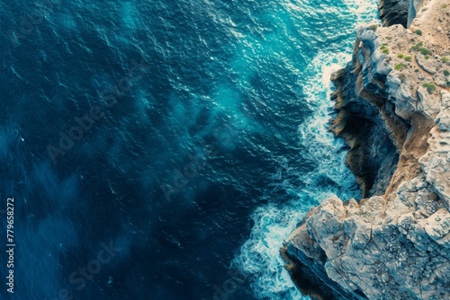 Aerial View of the Ocean and Cliffs, A panoramic aerial capture of a blue ocean and a rugged cliff, AI Generated