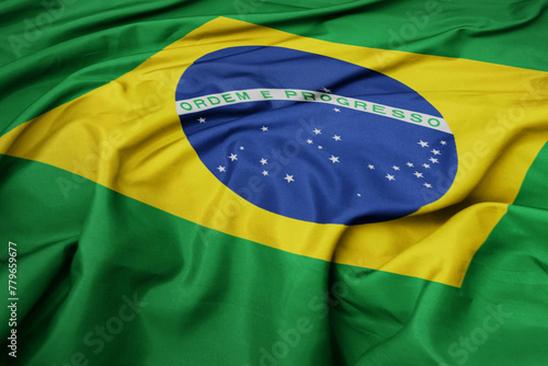 waving colorful national flag of brazil. photo