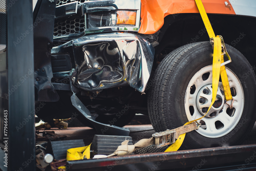 custom made wallpaper toronto digitalDamaged bumper front fender on pickup truck by car accident carrier on flatbed rollback slide tilt tray of tow truck with yellow ratchet strap tie down, collision, insurance claim concept, Texas