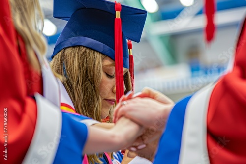 Unity in Achievement: Graduates Holding Hands
