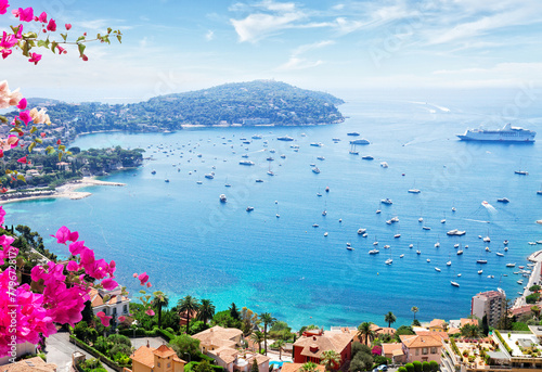 landscape of riviera coast, turquiose water and blue sky of cote dAzur at sunny summer day, France, toned