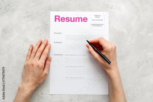 We are hiring. Employee filling resume files. Or HR manager reviewing resume applications