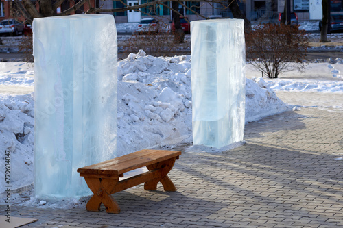 Ice blocks stand on the site on a winter morning. The beginning of city competitions for creating ice sculptures.