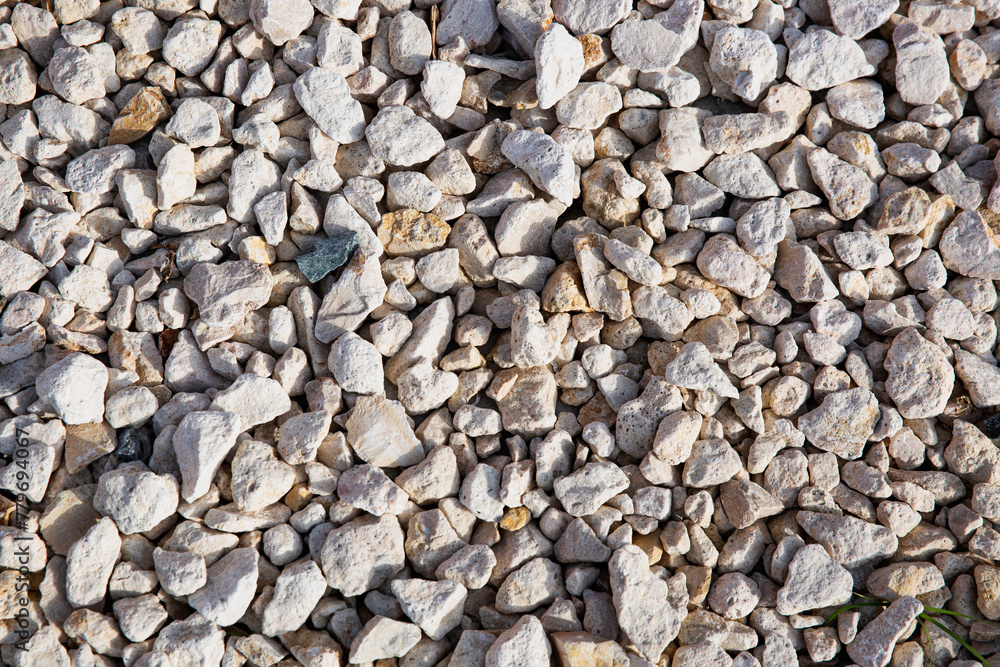 White stone gravel background texture. White stone gravel background texture.