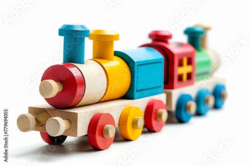 Colorful wooden toy train with blocks white background