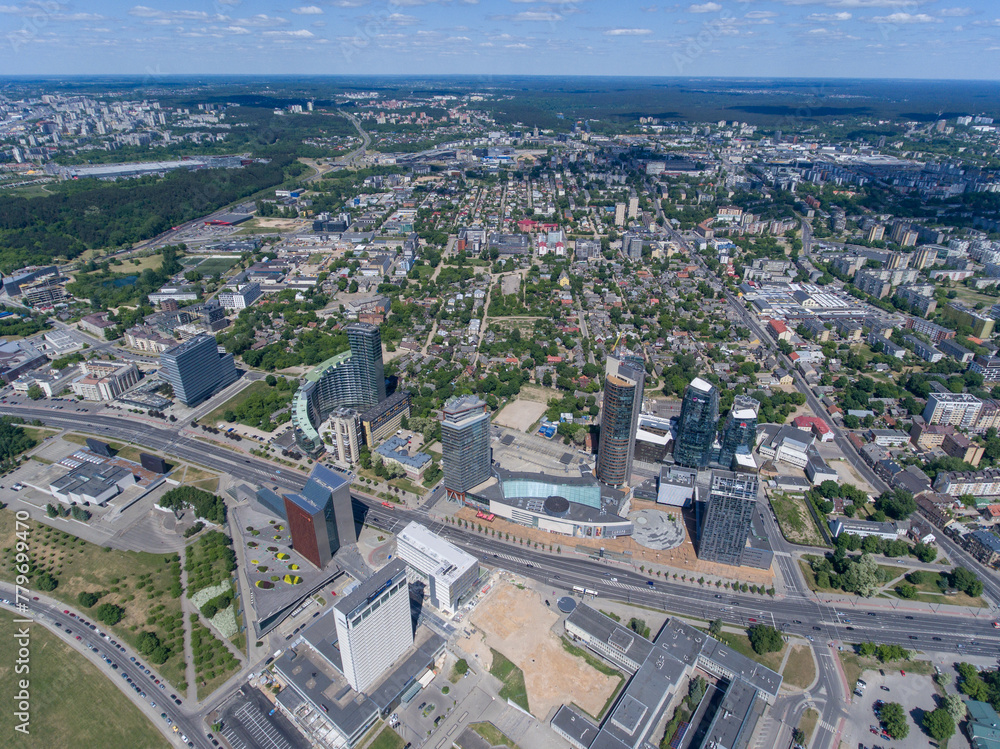Fototapeta premium Vilnius City Cityscape, Lithuania. Business Town in Background. Drone Point of View. Snipiskes District