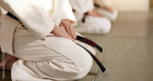 Hands of students, bow or men in dojo to start practice, discipline or self defense education in Japan. Black belt master, people learning respect or ready in fighting class lesson or aikido training