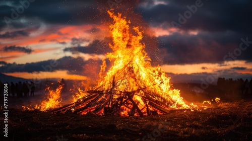 Dramatic Bonfire Ablaze at Dusk on Summer Solstice