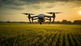 Photograph of commercial drone flying over crop fields. Technology in farming