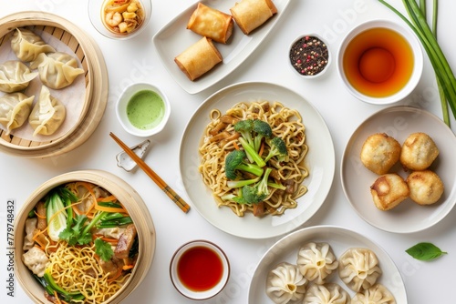 Assorted Asian cuisine dishes with dumplings, spring rolls, and stir-fry noodles