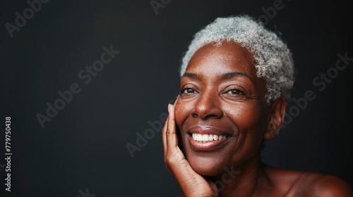 Radiant mature African-American woman with silver hair.