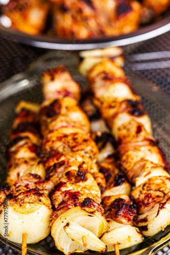 grilled chiken kebab in the garden in summer time