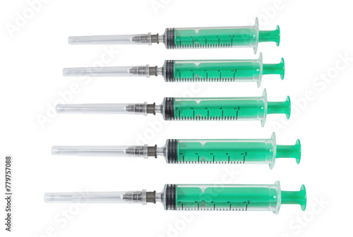 Medical syringes with green pistons on a white background