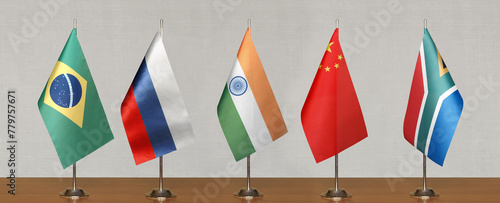 Cuadro en lienzo Tabletop flags of BRICS countries on a gray blurred background