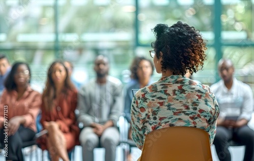 Confident Speaker at a Workshop Engages with Diverse Audience. Professional Development Event Captures Attendees Attention with Educational Talk. AI