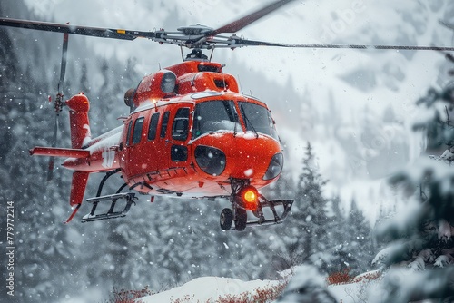 A red rescue helicopter during search and rescue work in the mountains. A helicopter searching for people in mountain forests. Forest search from above.