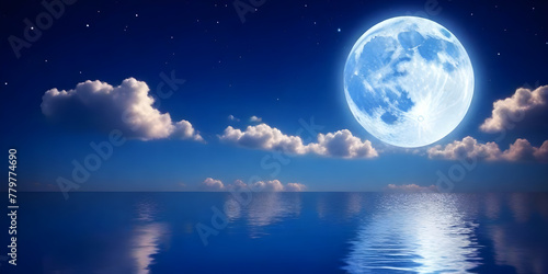 The full moon is shining brightly in the night sky  casting its reflection on the calm surface of the body of water below