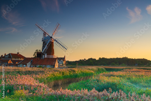 Bild auf Leinwand Sunset colours on Cley Windmill in the village of Cley, Norfolk, UK