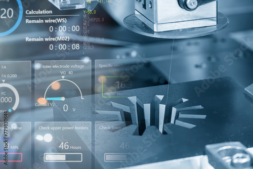 Abstract scene the wire EDM machine cutting the mold parts and graphic data background.