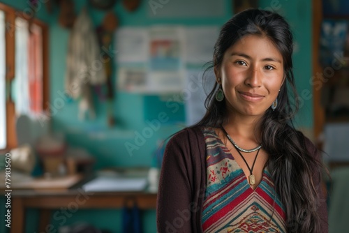 Peruvian woman in her office, smiling, looking at the camera